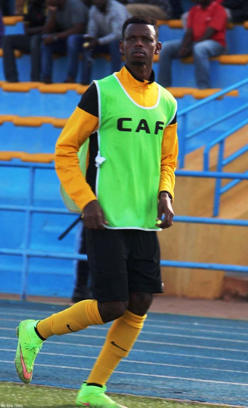 Alex Nkomezi, seen here warming up at Huye Stadium. The attacking midfielder will be out for up to a month with a knee injury. Courtesy