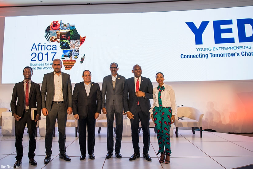 Young Entrepreneurs Day (YED) panelists, from left; YED Ambassadors Jean Bosco Nzeyimana and Mohamed Azab, President Abdel Fattah Al Sisi of Egypt, President Kagame, Nigerian busin....