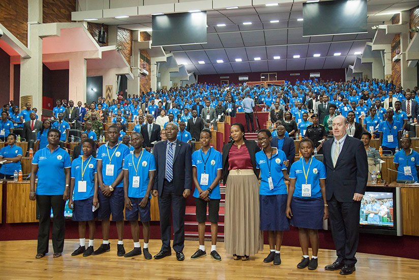 Prime Minister Dr. Edouard Ngirente and Gender and Family Promotion minister Esperance Nyirasafari, poses for a photo with all the children that attended the summit. / Nadege Imbabazi