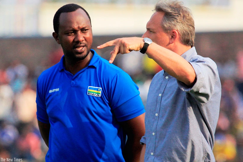 Amavubi head coach Antoine Hey chats with his assistant Vincent Mashami: The duo have alot to do before taking Amavubi to CHAN 2018 in Morocco next month. S. Ngendahimana
