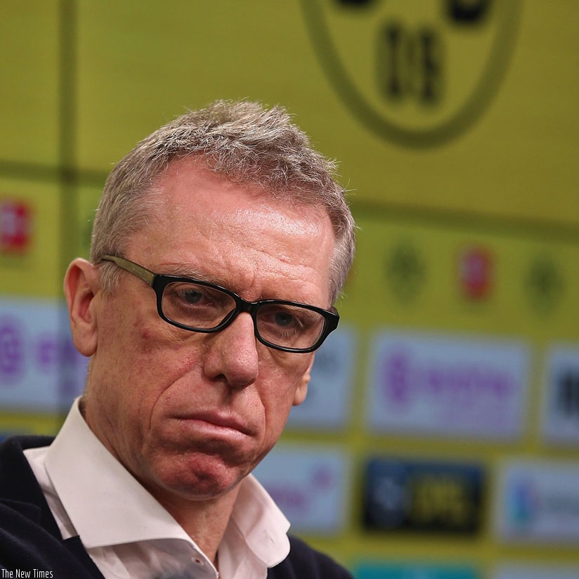 Austrian coach Peter Stoeger smiles at a press conference of Borussia Dortmund. (Net photo)