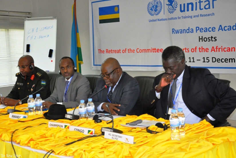 L-R: Director of the RPA, Col Jill Rutaremara; Phillip Karenzi, First Counselor, Rwanda Embassy in Ethiopia; Blaise Edouard Gouende, Chairperson of the Committee of Experts of the ....