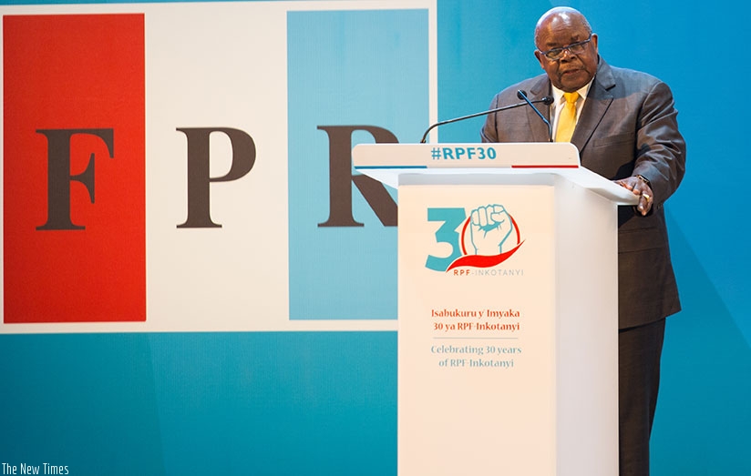 Mkapa delivers his keynote address at the international conference organised by the RPF-Inkotanyi in Kigali yesterday. (Photos by Timothy Kisambira)