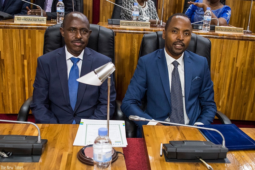 NEW BLOOD: Education and ICT ministers Dr  Mutimura and Rurangirwa (right), respectively, shortly before their inauguration at Parliament in Kigali yesterday. (All photos by Village Urugwiro)