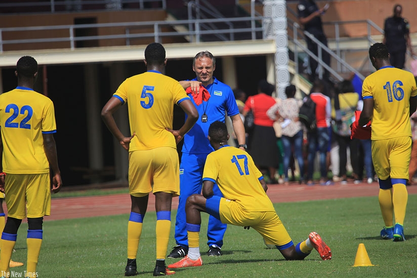 Amavubi head coach Antoine Hey  gives instructions to his players during  training at Amahoro National Stadium ahead of CECAFA Chellenge Cup. Sam Ngendahimana.