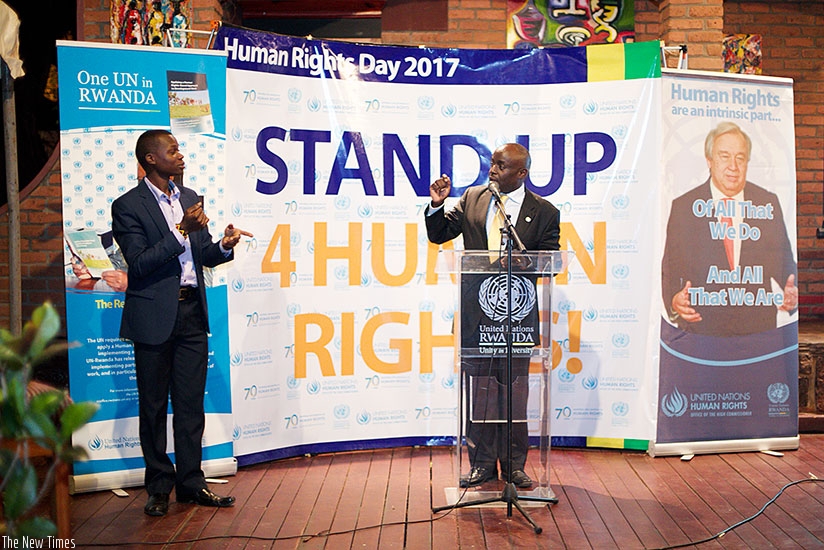 Chris Mburu, senior human rights advisor, United Nations Office of the High Commissioner for Human Rights, gestures to a participant at the event in Kigali. Courtesy.