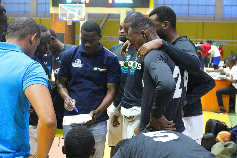 Patriots head coach Henry Mwinuke (centre) briefing players during last Saturday in a game against Espoir. / Courtesy