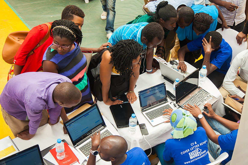 Job-seekers register for the 4th Kigali job fair at Petit Stade, Remera in May. / File