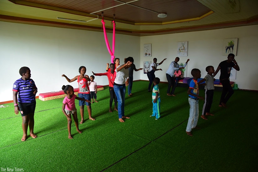 Children practice the traditional dance  