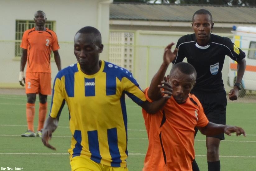 AS Kigali midfielder Tumaine Ntamuhanga battles for the ball with a Bugesera FC player during last season's first league meeting that ended 0-0 at Kigali Stadium. S. Ngendahimana
