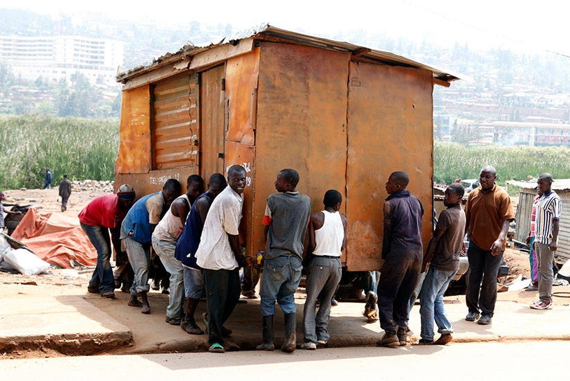 Some  of the establishments set up in Gatsata marshlands being relocated recently . Timothy Kisambira. 