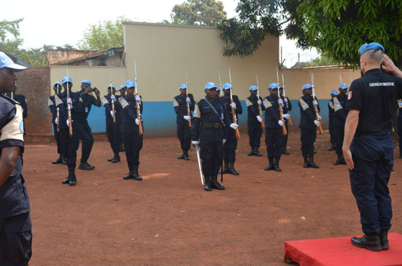 MINUSCA Police Commissioner inspecting a Guard of Honor mounted by Rwandan peacekeepers, on arrival at their base camp. / Courtesy