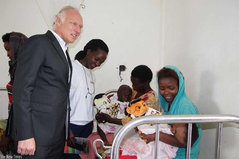 Marriott staff interacting with mothers at the hospital.rn