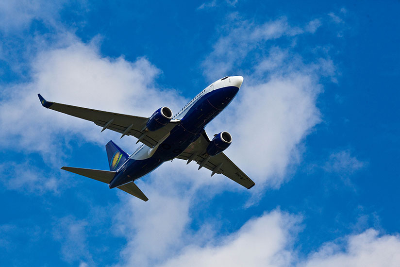 RwandAir plane takes off at Kigali International Airport. (Timothy Kisambira)