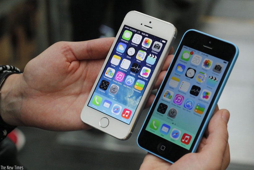 A phone user displays his handset. Some people prefer recycling of electronics instead of discarding them. (Net photo)