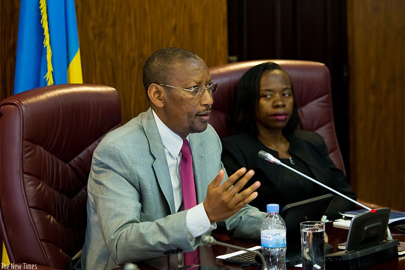 Central bank governor John Rwangombwa and his deputy Dr Monique Nsanzabaganwa at the media briefing in Kigali yesterday. Timothy Kisambira. 