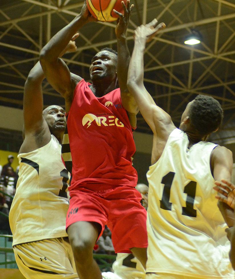 Bienvenu Ngandu of REG in action during last season's regular league game against Patriots. The two giants meet tonight at Amahoro Indoor Stadium. Samuel Ngendahimana.