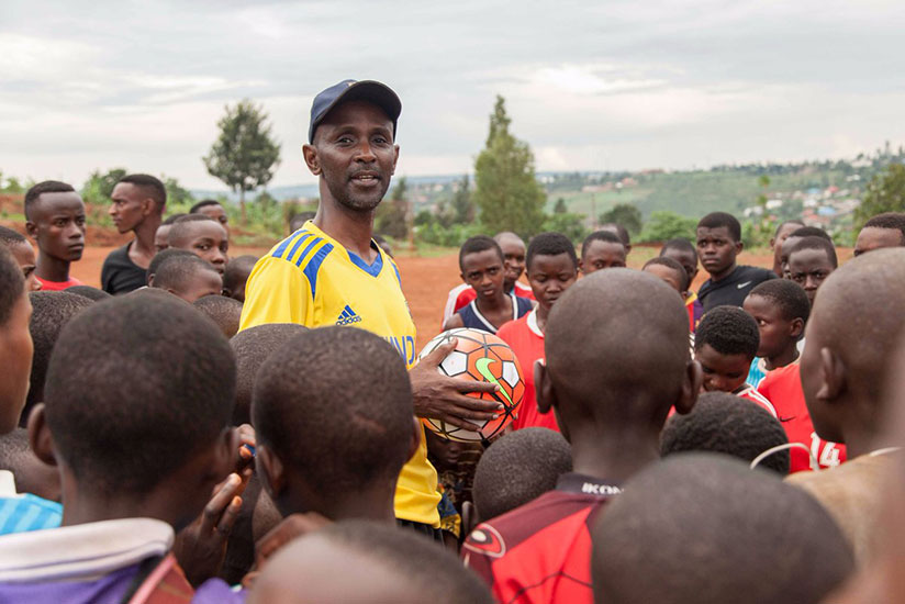 Murangwa talks to a group of young Rwandan football players during a training session last year. The former Rayon Sports' goalkeeper says he believes in the power and influence of ....
