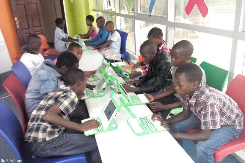 Children share computer skills and learn from one another. Teamwork leads to success. (Dennis Agaba)
