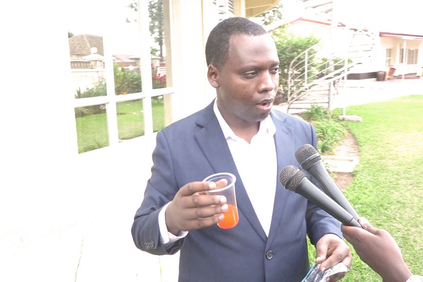 Dr Biziyaremye shows how the new syrup TB medicine for children looks like during a training. (Lydia Atieno)