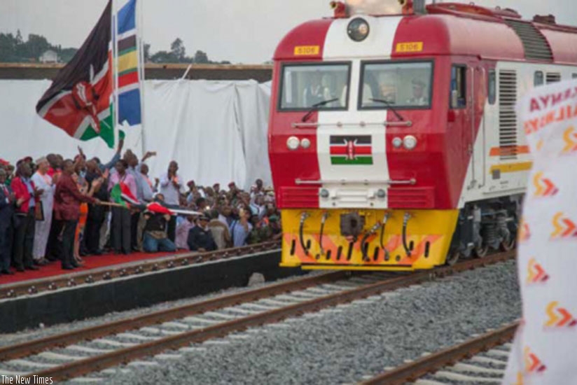 President Kenyatta flagging off the standard gauge railway train last year. (Net photo)
