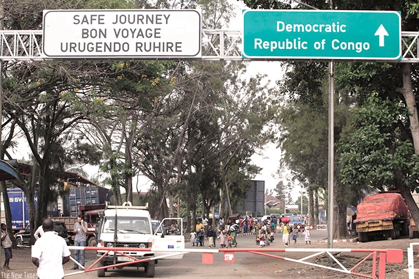 Cross-border traders at the Rwanda-DR Congo border in Rubavu District. Small-scale traders complain of illegal taxes levied by DR Congo authorities contrary to commitments from bot....