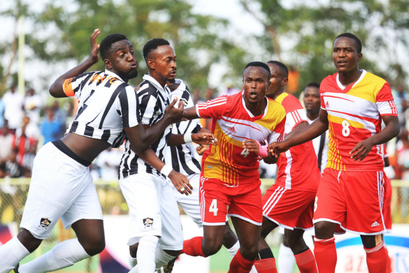Musanze FC and APR FC players vie for the ball during the recent league match at Kigali Stadium. / Sam Ngendahimana
