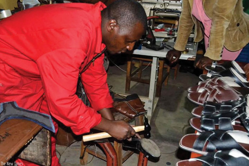 A local entrepreneur makes shoes. (File)