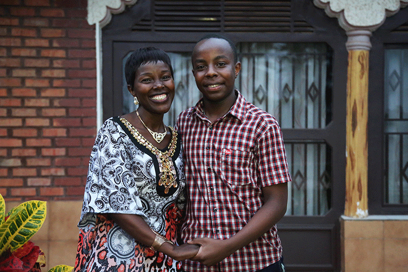 Triumphant: Kigali Parents' Josyln Karenzi Manzi, who emerged the best performer in O-Level national examinations, is congratulated by her mother, Clementine Mukarutabana, at their....