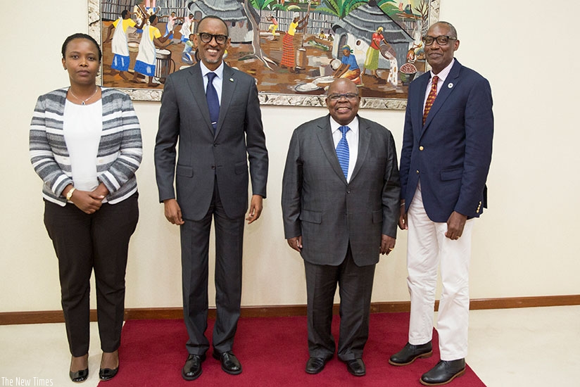 President Kagame in a group photo with Co-Chair of Africa Wildlife Foundation (AWF) Board Benjamin Mkapa; AWF president Kaddu Sebunya (right); and the chief executive of Rwanda Dev....