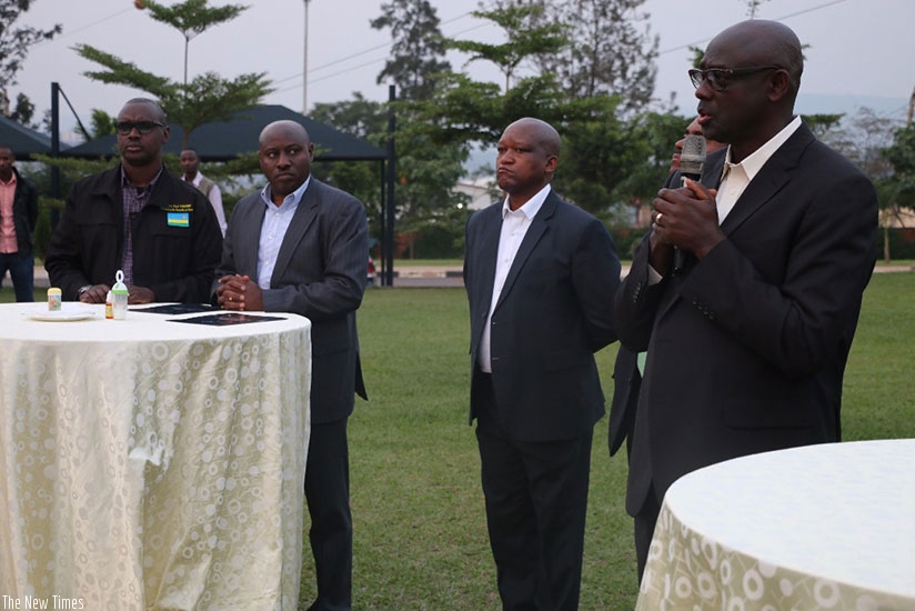 Minister Johnston Busingye speaking at the official sent off party of the retired police officers