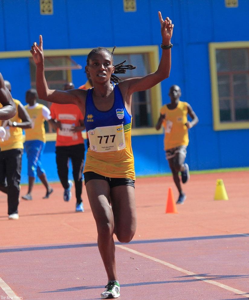 Nyirarukundo crosses the finish line during Kigali International Peace Marathon. / File
