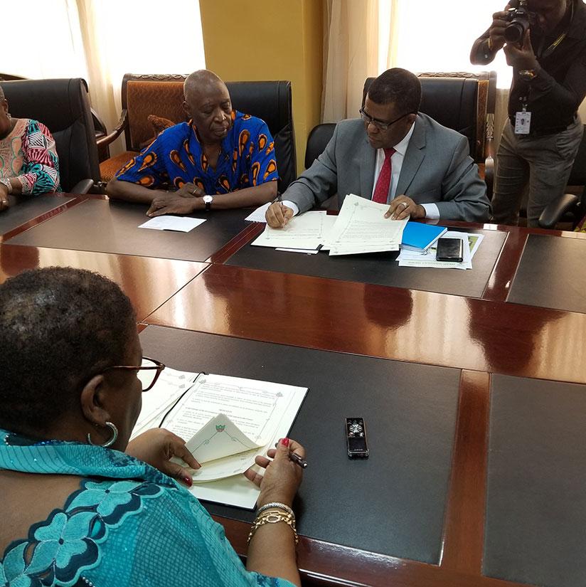 Dr. Belay Begashaw, Director General of the SDGC/A and Ambassador Marjon V. Kamara, Liberian Minister of Foreign Affairs sign the Host Country Agreement that will facilitate the es....