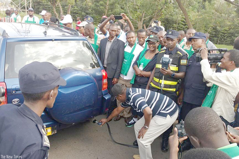  Vincent Biruta, Minister for Environment, during the exercise of testing emissions from car last year. File