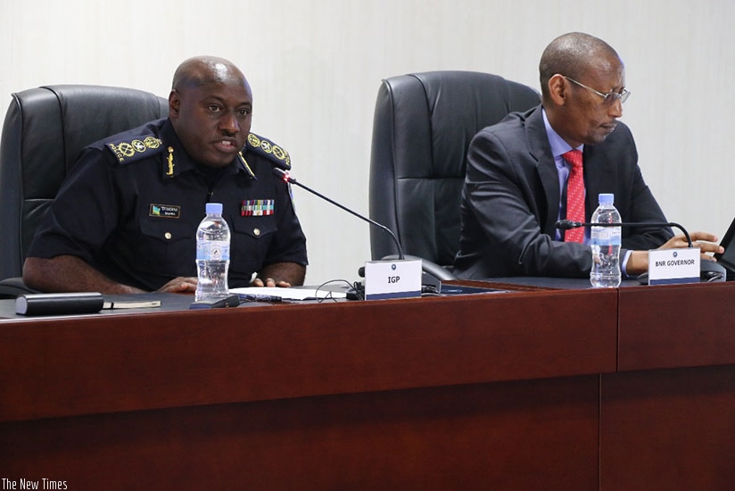 IGP Emmanuel Gasana and Central bank governor, John Rwangombwa during the meeting in Kigali yesterdaty. Courtesy.