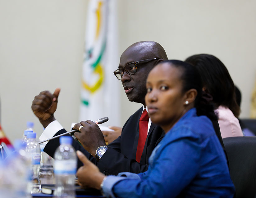 Minister for Justice Johnston Busingye speaks during the post cabinet  meeting press briefing yesterday. / Timothy Kisambira