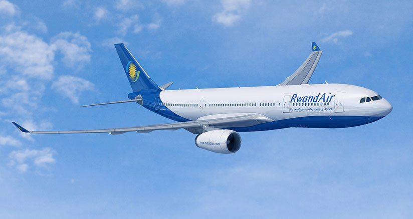 A RwandAir plane. Will the upcoming launch of the single African air transport market turn around aviation sector fortunes? / File.  