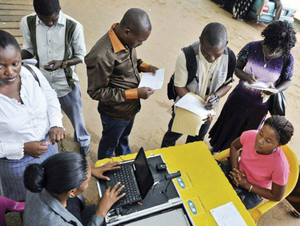 MTN customers register their SIM cards during a past registration exercise. / File