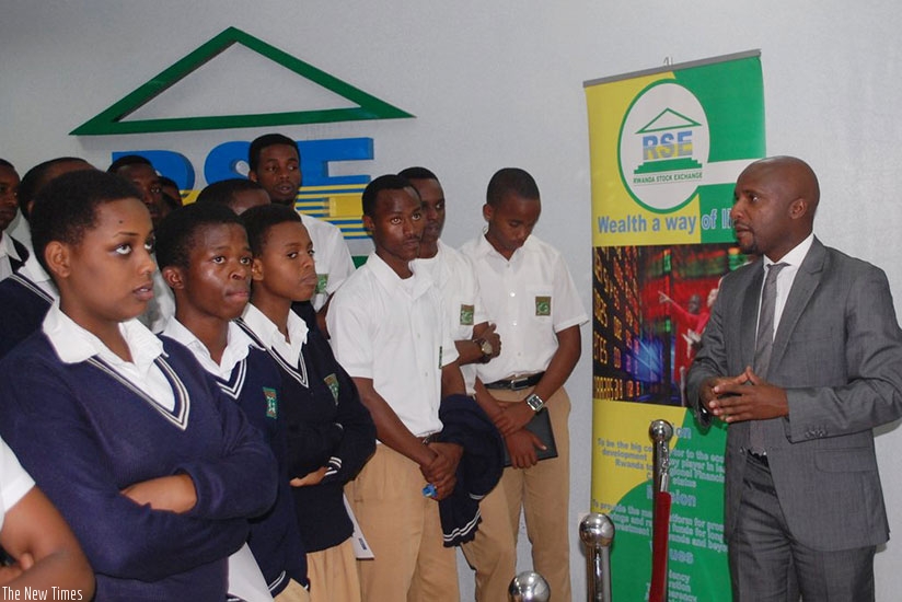Rwabukumba explains to students how the bourse works last year. File.