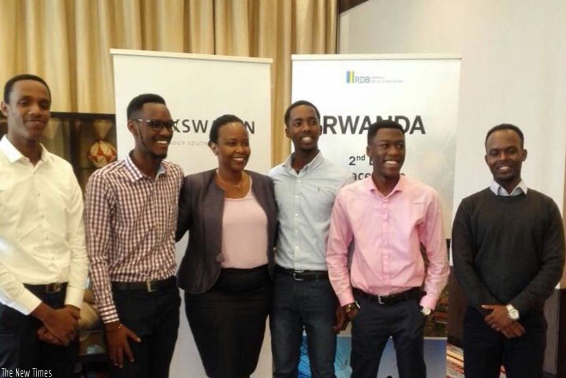 RDB CEO Clare Akamanzi poses in a group photo with members of Awesomity Lab. Courtesy. 