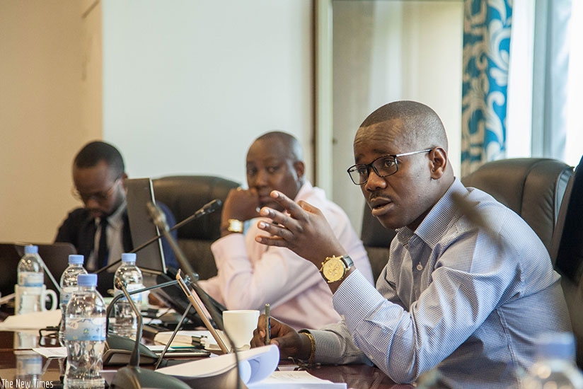 The State Minister for Constitutional and Legal Affairs, Evode Uwizeyimana, briefs the MPs on the motivation of the government's inclusion of 'plea bargain' as part of the draft la....