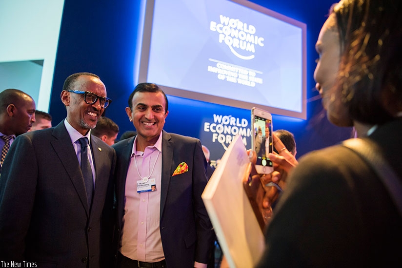 President Kagame with a delegate at the 48th World Economic Forum meeting in Davos, Switzerland yesterday. Village Urugwiro.