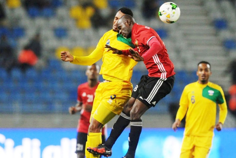 Rwanda midfielder Ally Niyonzima challenges Abdulrahman Ramadhan Khalleefah of Libya during the second half. Amavubi lost 1-0 to finish third in Group C and bow out of the tourname....