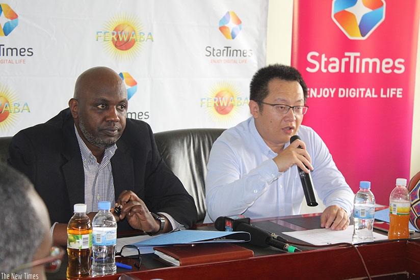 Desire Mugwiza signed on behalf of FERWABA while Star Times was represented by its Chief Executive Officer, Jess Yuchang. Courtesy.