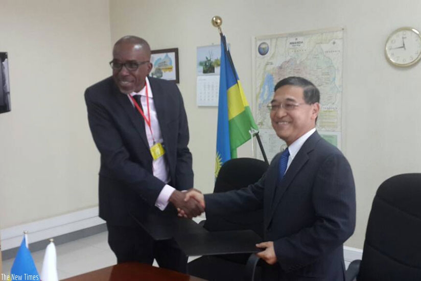The Japanese envoy, Takayuki Miyashita, and the Rwanda Karate Federation president, Theogene Uwayo, signed the deal on Friday. (James Karuhanga)