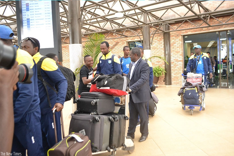 Amavubi assistant coach Vincent Mashami and the Director of Sports in the Ministry of Sports and Culture on arrival Kigali International Airport last Friday and there was no one to....