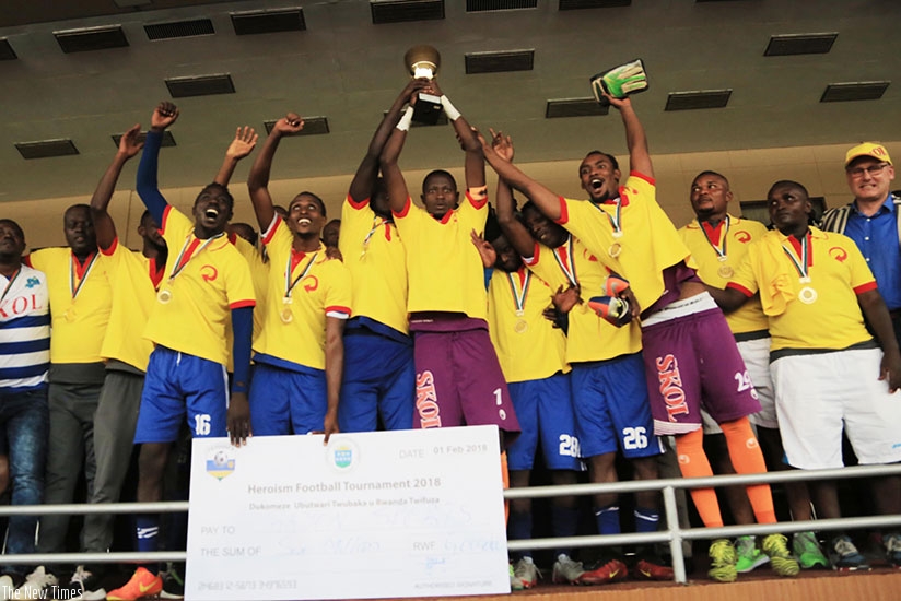 Rayons Sports players celebrate the Heroes Cup title winning despite losing 2-0 to APR. Sam Ngendahimana.
