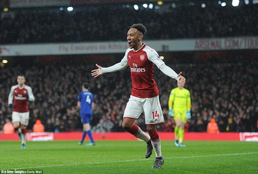 Pierre-Emerick Aubameyang celebrates scoring his first Arsenal goal as Arsenal ran out emphatic 5-1 winners against Everton