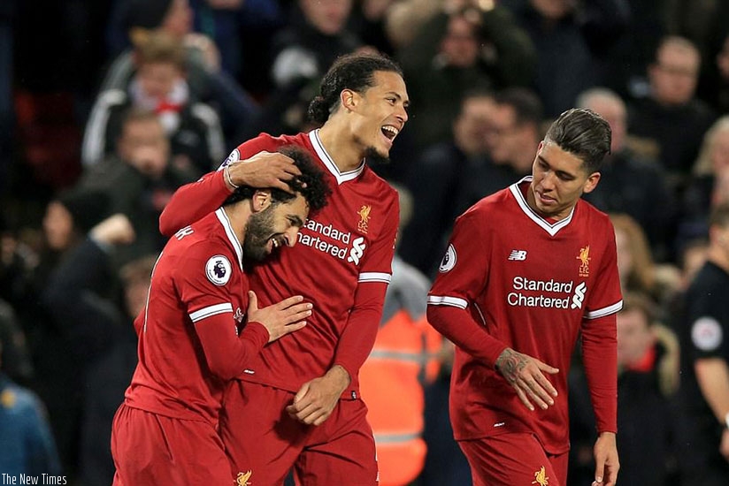 Salah is congratulated by Van Dijk - it was the defender who later fouled Lamela to give away the second penalty. (Net photo)