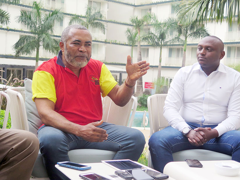 Nigerian film producer and director, Orji Zachee Ama (left) speaks to the media last week during a news conference in Kigali. Looking on is Willy Ndahiro, the director of Hillywood....